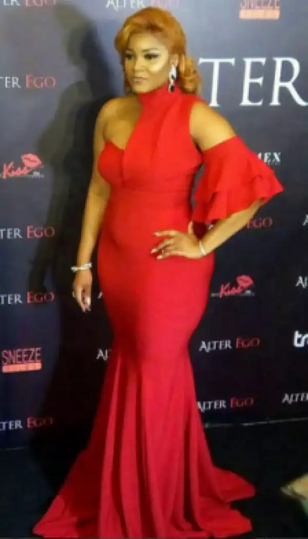 Actress Omotola Steps Out With Her Hubby In No Bra Outfits To Alter Ego Movie Premiere (Photos)